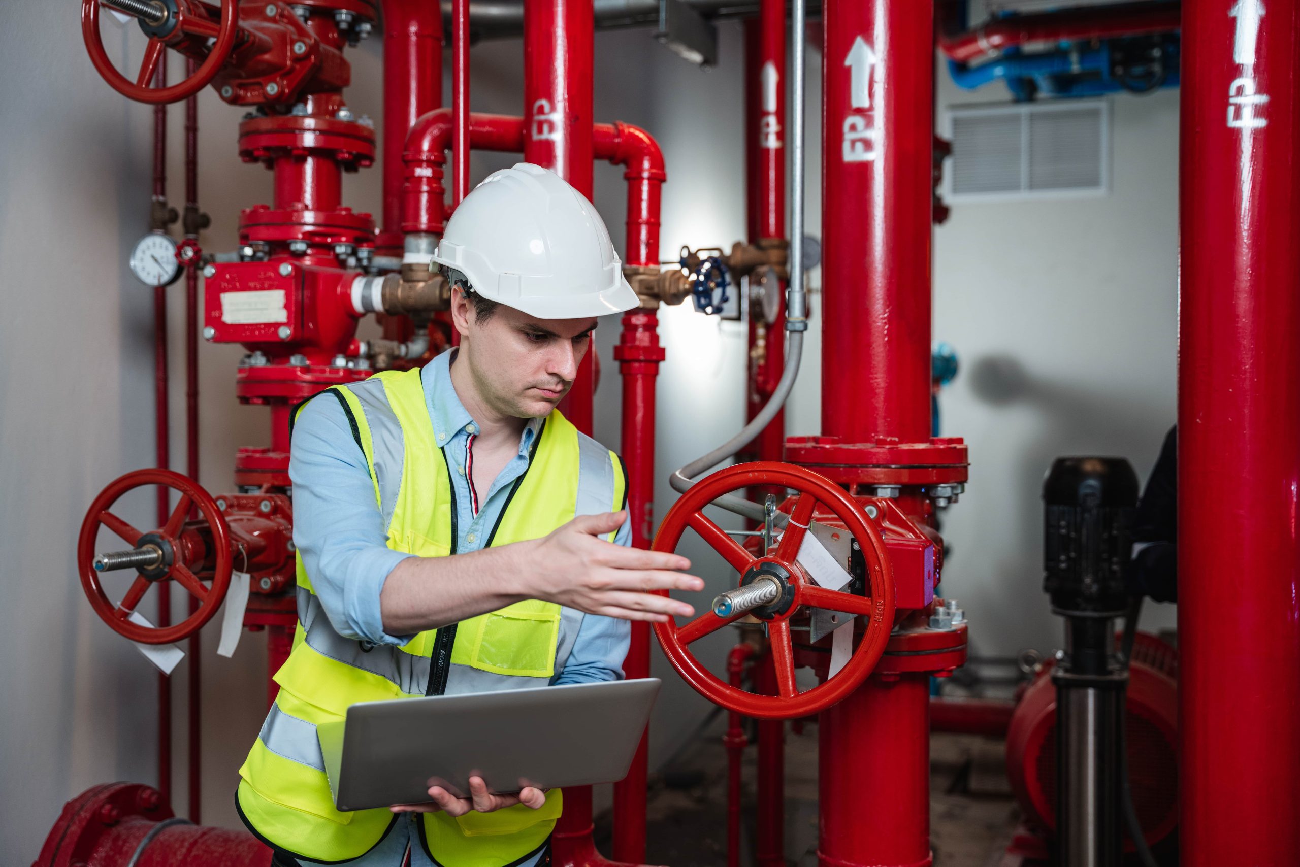 engineers-inspecting-the-inside-plumbing-and-water-2023-11-27-05-19-08-utc-min