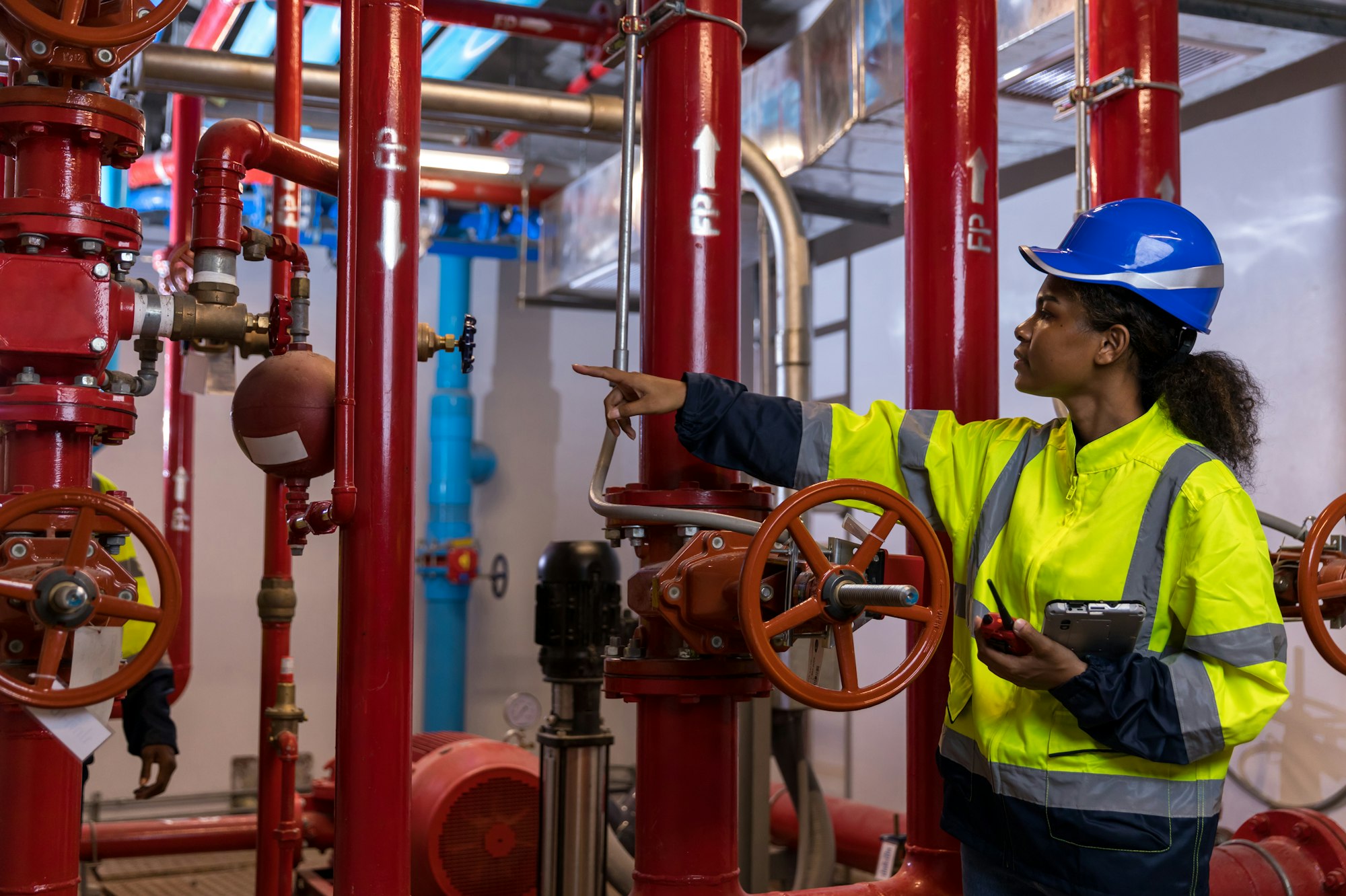 Engineer or technician work checking Fire suppression system and fire equipment.